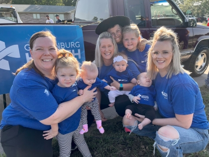 Staff and their kids at the parade