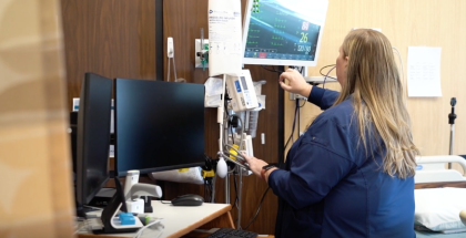 Nurse using technology for care